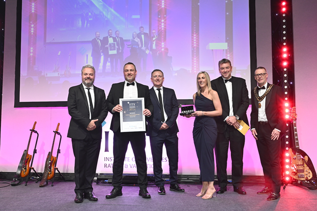 (left to right) The IRRV Performance Awards 2024 host Hal Cruttenden, Payment Plan's Rob Ryan, Rugby Borough Council's revenues manager Richard Moore, team leader Faye Watts, Tom Gray, chief executive officer of Southwater Event Group, and Nick Rowe, president of the IRRV.