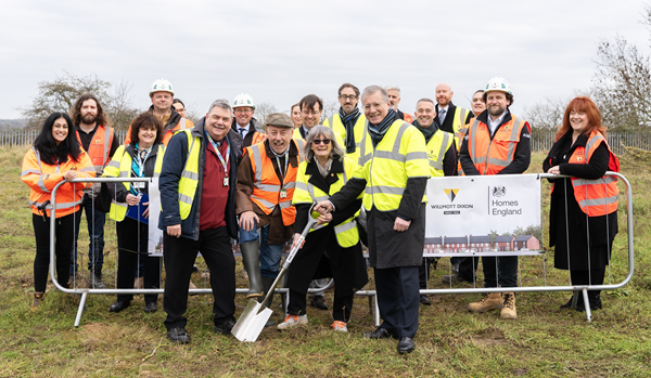 (front, left to right) Ward Cllr Neil Sandison, Cllr Tim Willis, Rugby Borough Council portfolio holder for communities, homes, digital and communications, Cllr Carolyn Robbins, portfolio holder for finance, performance, legal and governance, and Rugby MP, Mark Pawsey, joined representatives from the council and Willmott Dixon at Friday's ground-breaking ceremony at Biart Place.