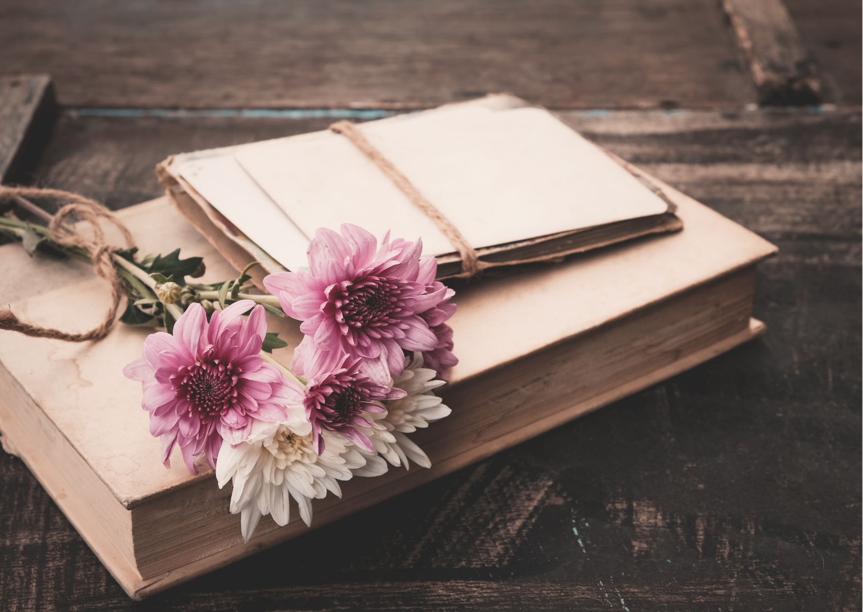 Book with flowers on top